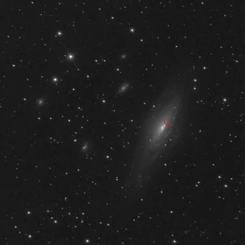 A near infrared image of the type Ia supernova SN2025rbs in the galaxy NGC 7331, marked by red crosshairs. Other members of the visual Deer