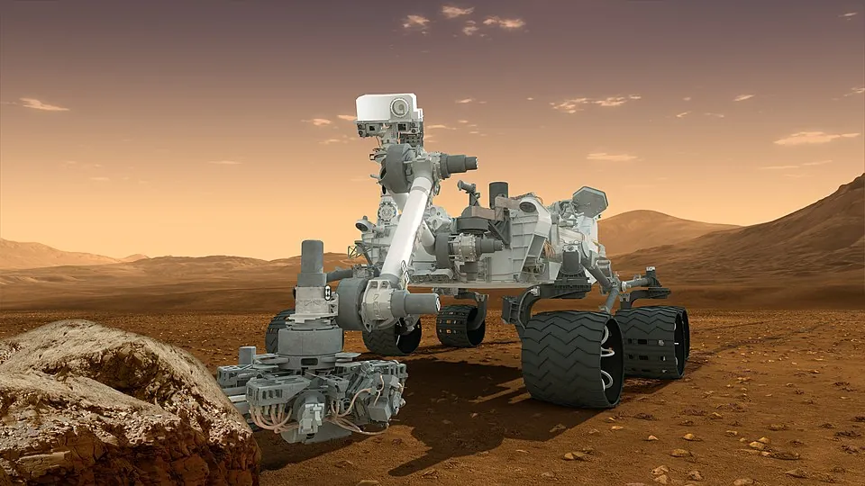 火星の地表を調べる探査車キュリオシティの想像図