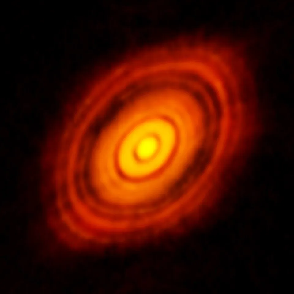 若い星おうし座HL星のまわりの、惑星が生まれつつある円盤（アルマ望遠鏡の画像）